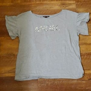 Victoria's Secret tee.